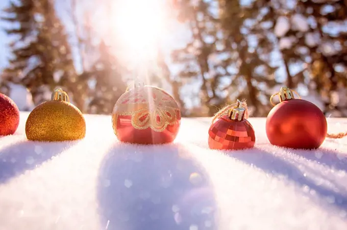 Christmas ornaments in snow