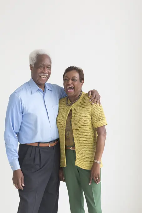 Portrait of laughing older Black couple