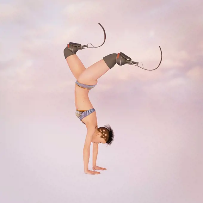 Woman with artificial legs performing handstand