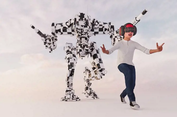 Boy wearing virtual reality goggles imitating robot soldier