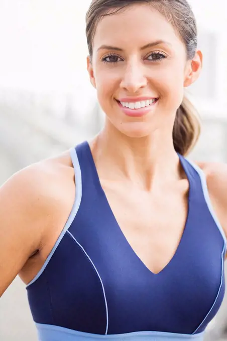 Smiling Hispanic woman in sportswear