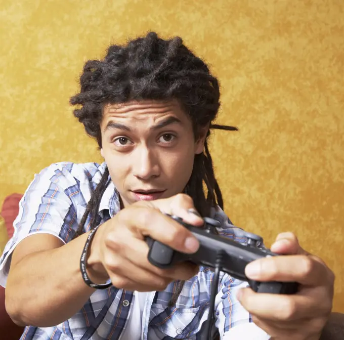 Close up young man playing video games