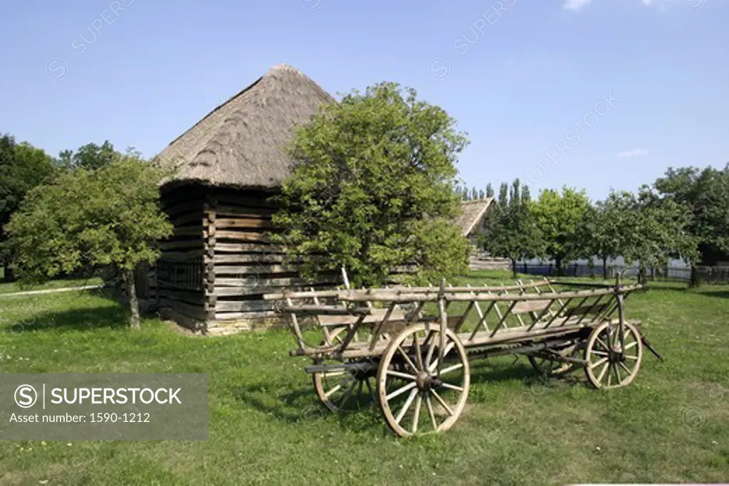Czech Republic, Straznice, Cart standing near hut