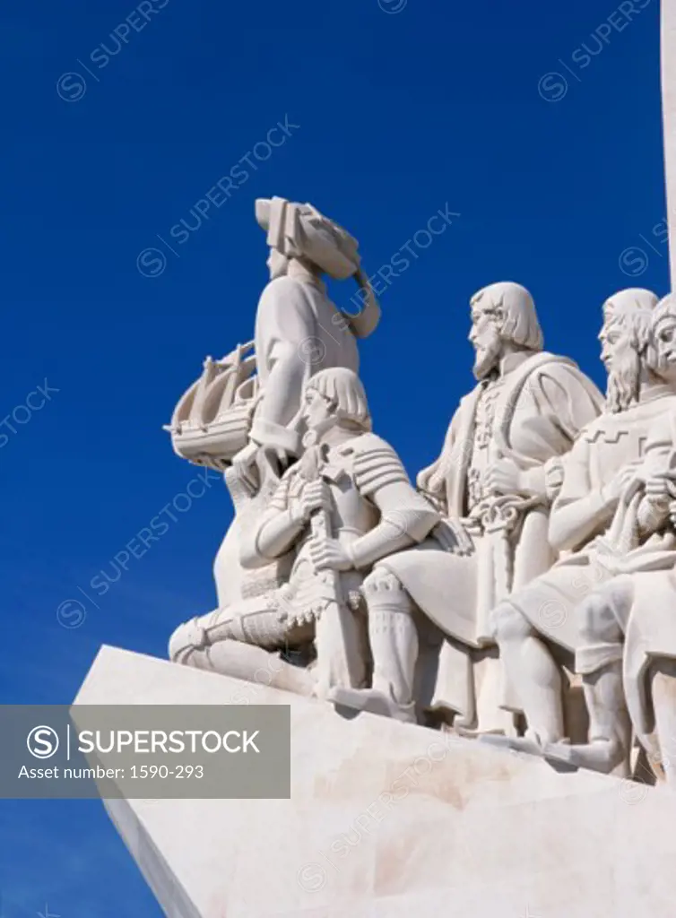Low angle view of statues on a building, Monument to the Discoveries, Lisbon, Portugal