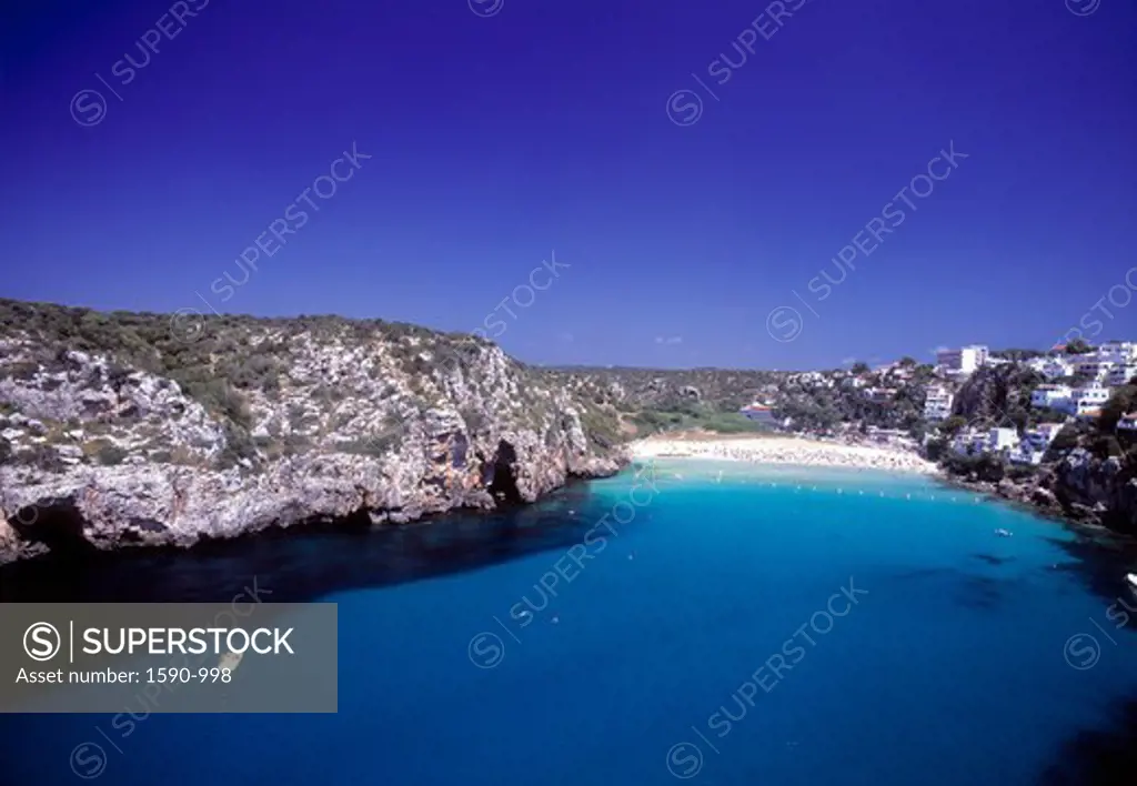 Spain, Minorca, Calan Porter, Minorca, Calan Porter, Elevated view of tourist resort by sea