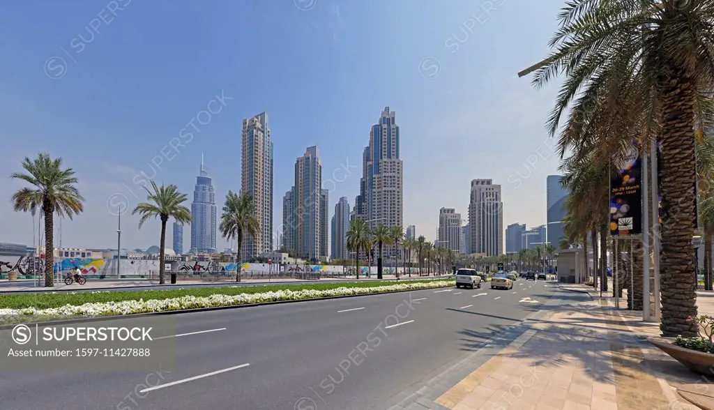 Asia, United Arab Emirates, UAE, Dubai, Sheikh Mohammed Bin Rashid boulevard, street scene, palms, architecture, trees, buildings, constructions, lant...
