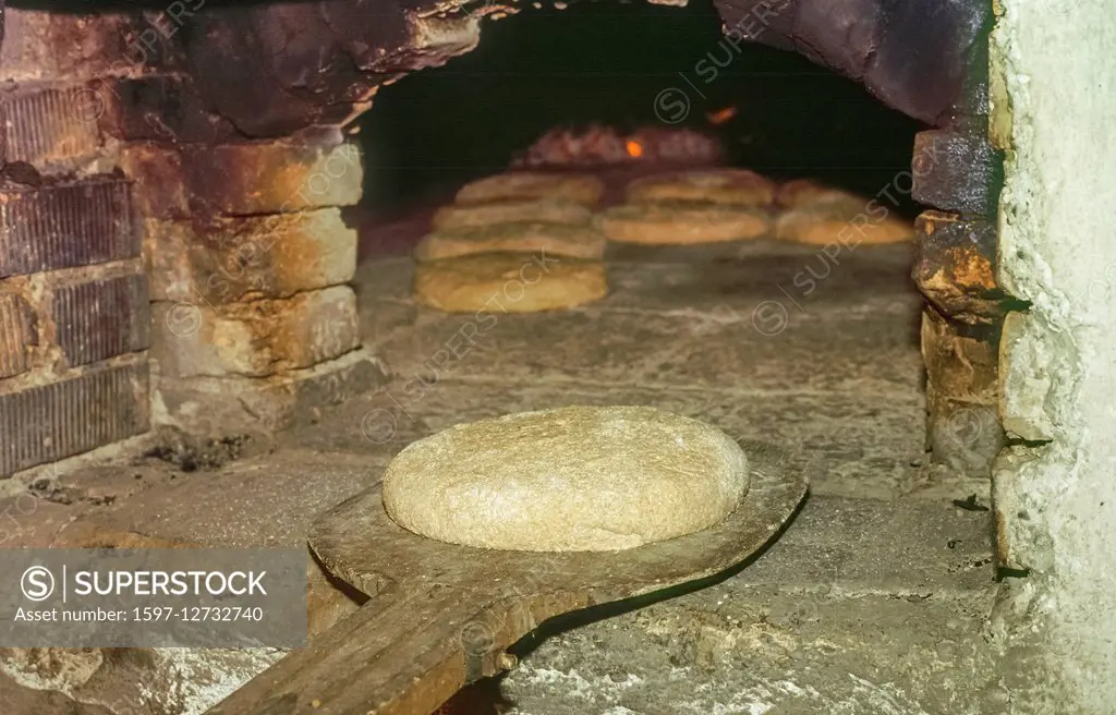 baking bread in wooden stove in Bavaria
