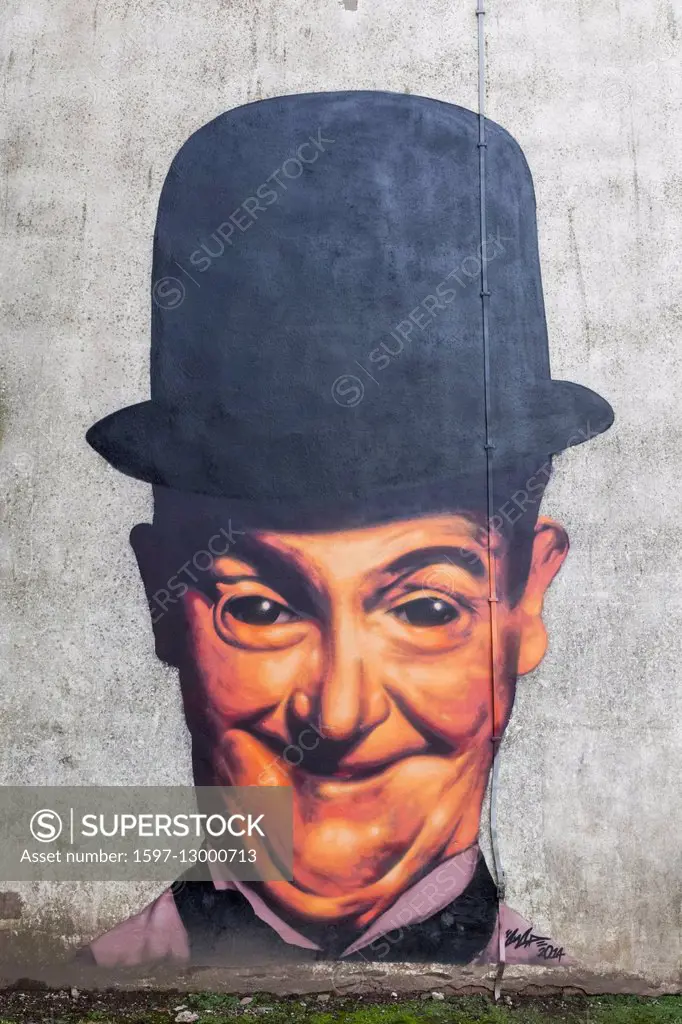 England, Cumbria, Lake District, Ulverston, The Laurel and Hardy Museum, Wall Art Painting of Stan Laurel