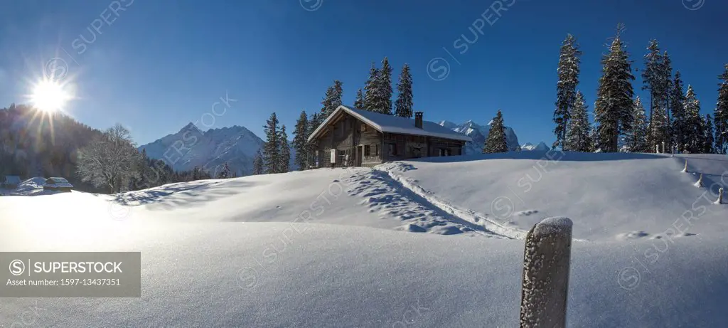 alp huts in Hasliberg in winter, canton of Berne