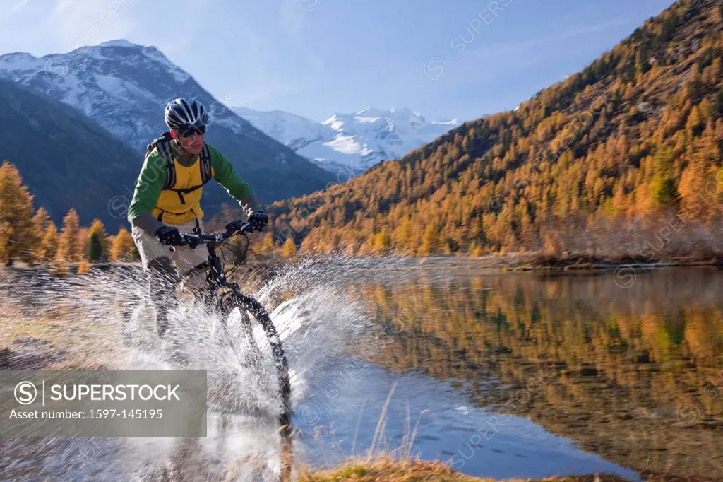 Mountain, mountains, mountain lake, autumn, Bicycle, bicycles, bike, riding a bicycle, riding a bike, bicycle, bike, wood, forest, canton, Graubünden,...
