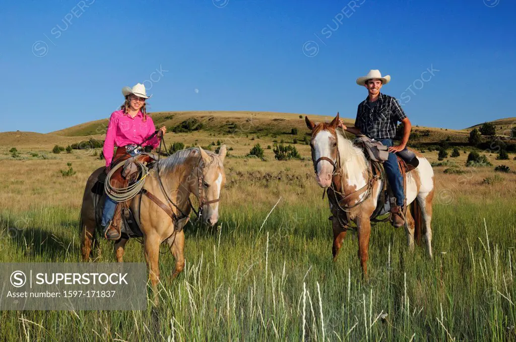 Pacific Northwest, Oregon, USA, United States, America, riding, horseback, sport, horse, ranch, cowboy, cowgirl, girl, woman, grass, green