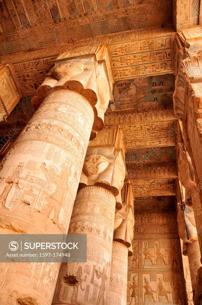 The high hypostyle hall with hathor columns and beautiful painted ceiling in the the ancient Egyptian fertility and love temple of the goddess Hathor ...