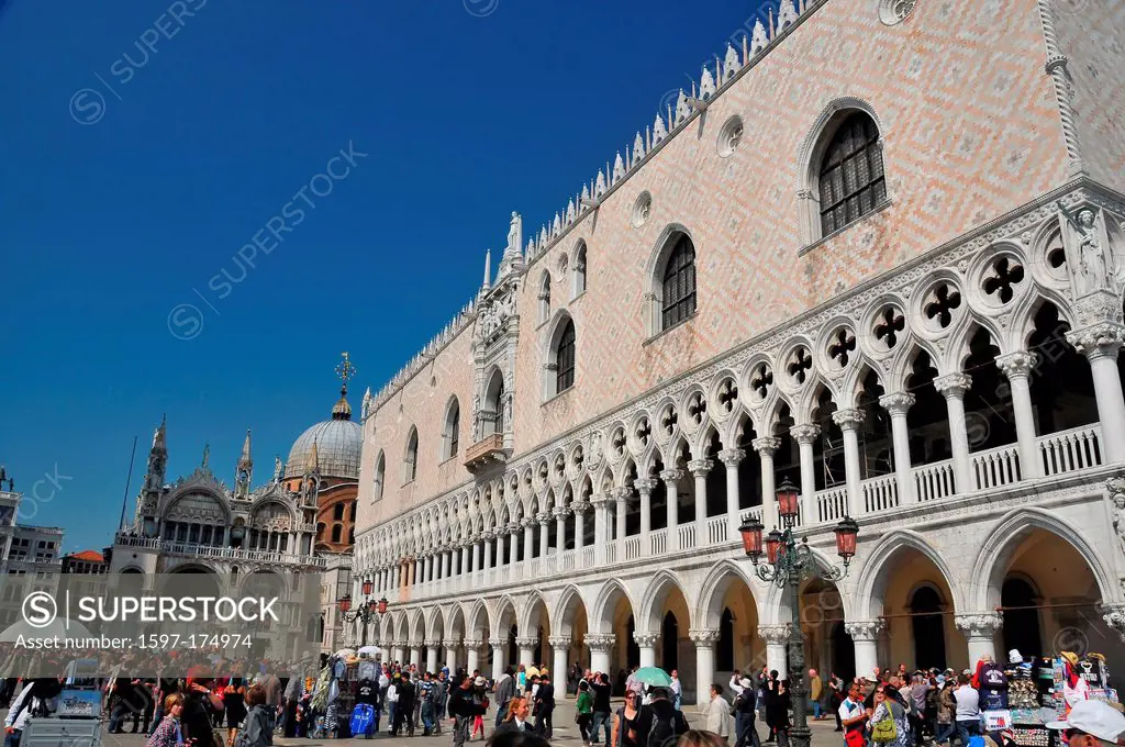 VENICE, ITALY - MAY 5, Tourists enjoy the spring sunshine in Saint Mark´s Square in front of the basilica and the doge´s palace. May 5, 2011 in Venice...