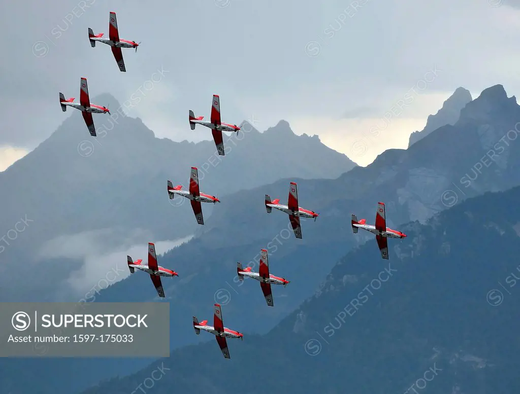 SION, SWITZERLAND, Swiss air force PC_7 team in formation at the Breitling Air show. September 17, 2011 in Sion, Switzerland