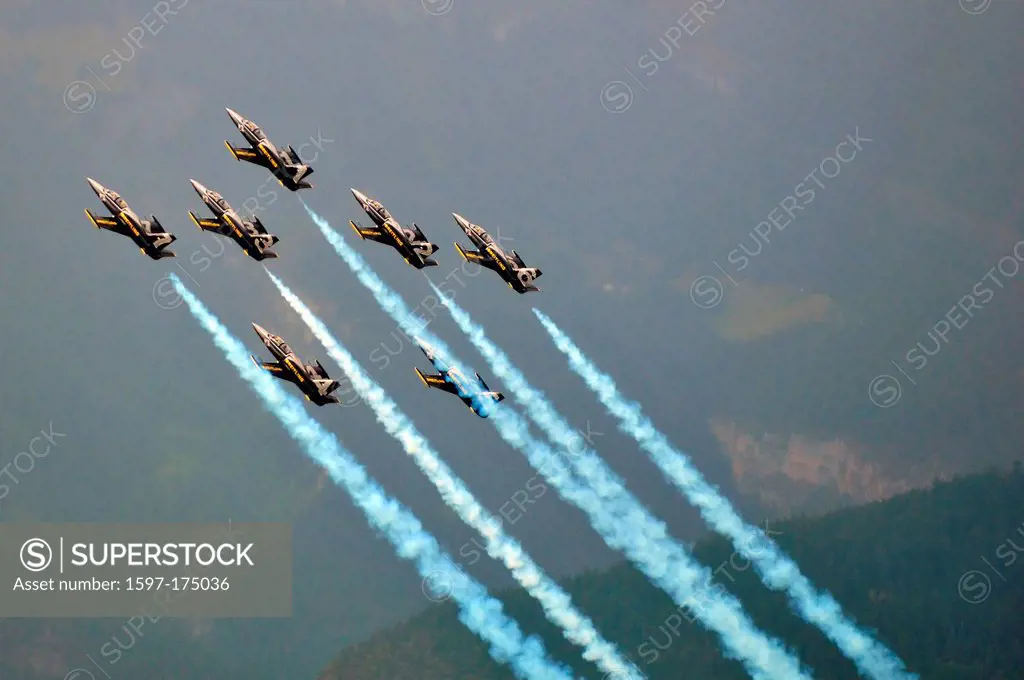 SION, SWITZERLAND, Breitling jet team in close formation trailing smoke at the Breitling Air show. September 17, 2011 in Sion, Switzerland