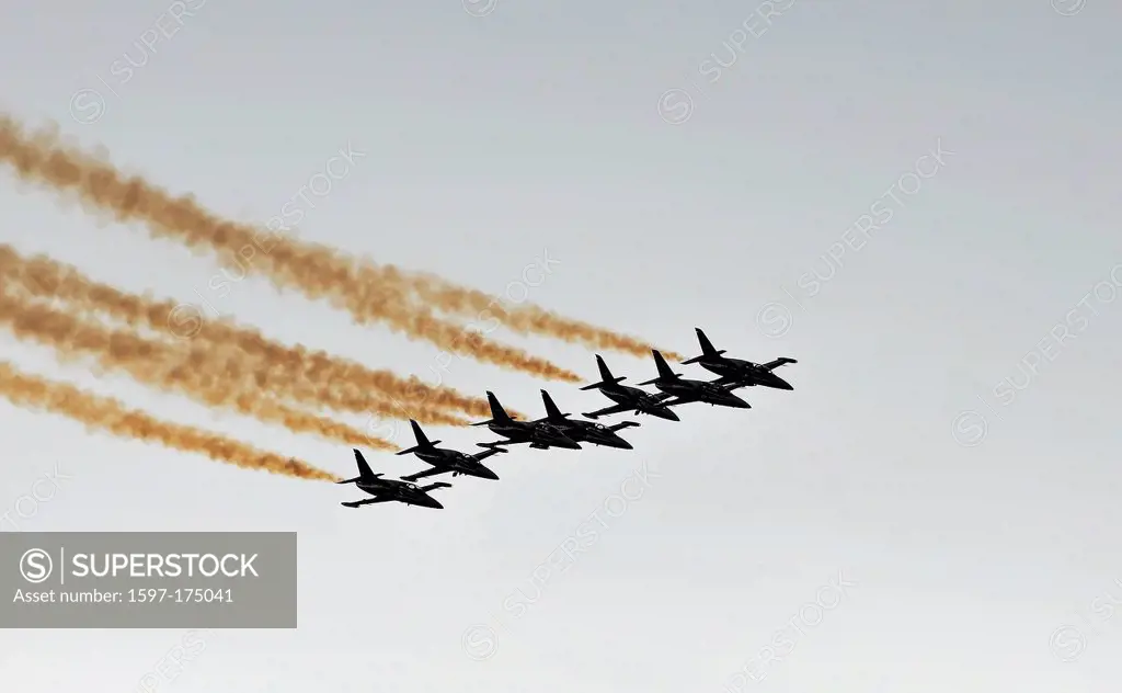SION, SWITZERLAND, Breitling jet display team in close formation trailing smoke at the Breitling Air show. September 18, 2011 in Sion, Switzerland