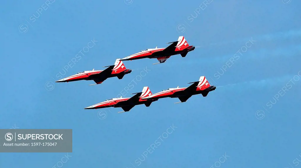SION, SWITZERLAND, Swiss Air Force team in formation in a blue sky at the Breitling Air show. September 18, 2011 in Sion, Switzerland