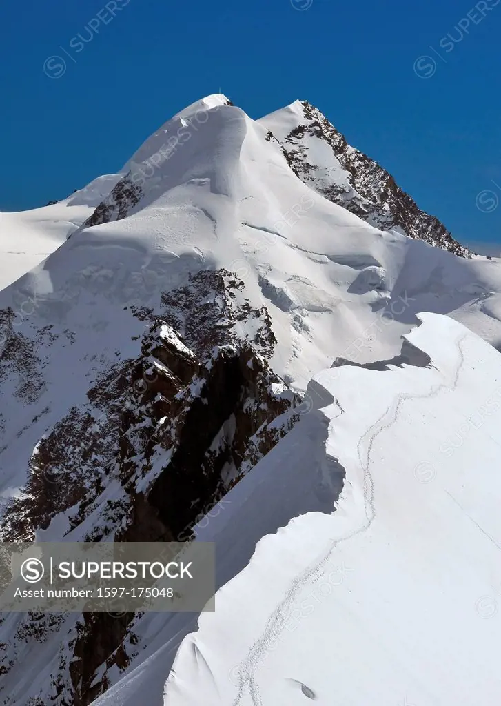 The challenging and beautiful twin summits of Liskamm in the swiss alps above Zermatt