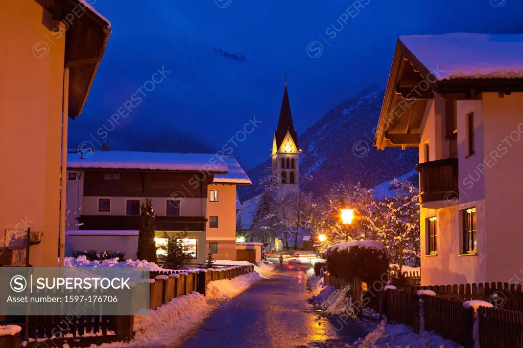 Austria, Europe, Tyrol, Oberinntal, Schönwies, church, winter, evening, winter evening, dusk, twilight, night, lights, houses, homes, lanterns, street...