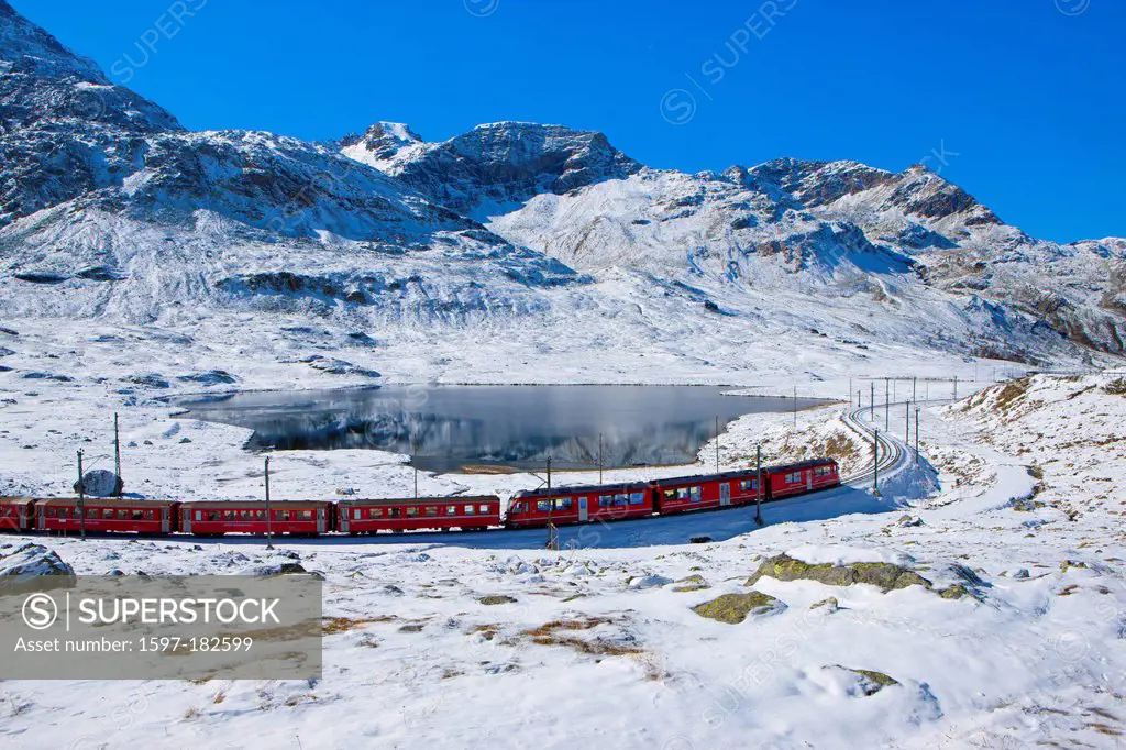 Bernina Pass, Switzerland, Europe, canton, Graubünden, Grisons, winter, Rhaetian Railway, Bernina Railway, train, railroad, reservoir, Lago Bianco, la...