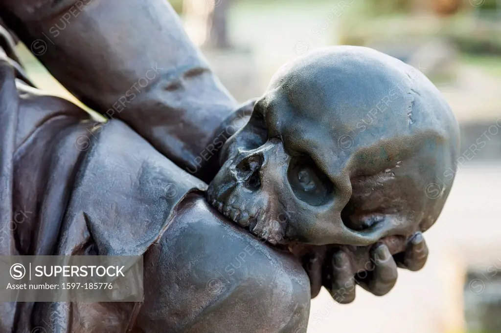 England, Warwickshire, Stratford-upon-Avon, Bancroft Gardens, Gower Memorial, Detail of Hamlet's Hand Holding Skull