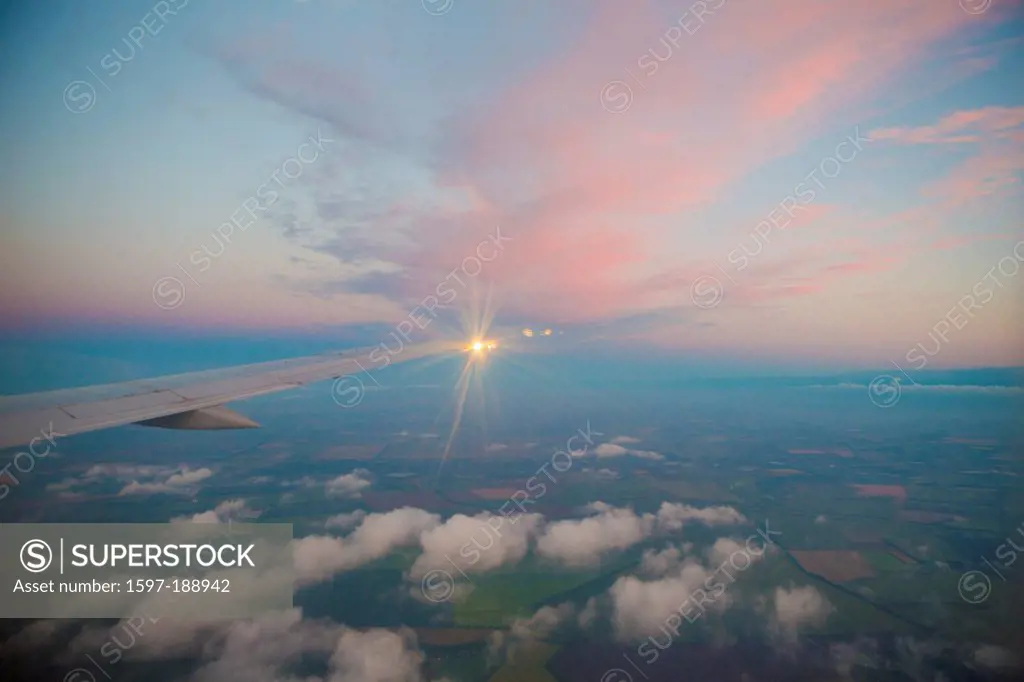 airplane, cloud, clouds, flight, light, sunset, travel, trip, holiday, fly, wing