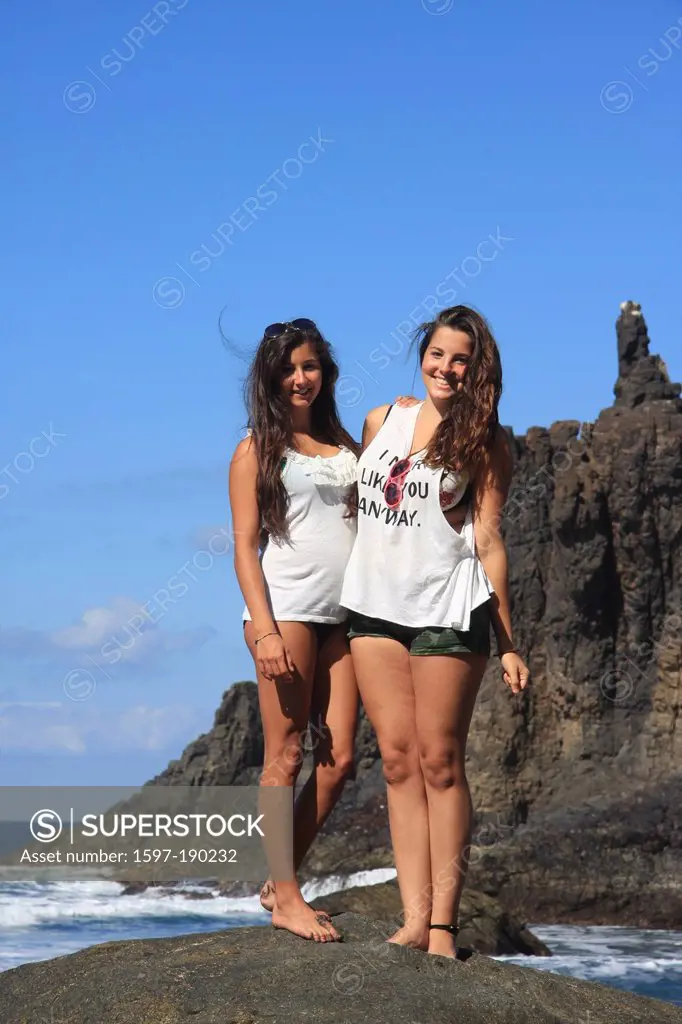 Spain, Europe, Canary islands, Tenerife, volcanical, cliff, rock, Benijo, sea, beach, seashore, girl, woman, teenager, two, women, T-shirt, fun,