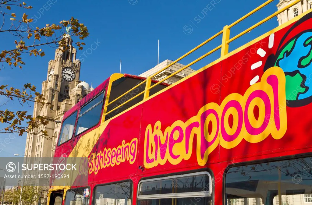 Tour bus and Liver building, Liverpool, England