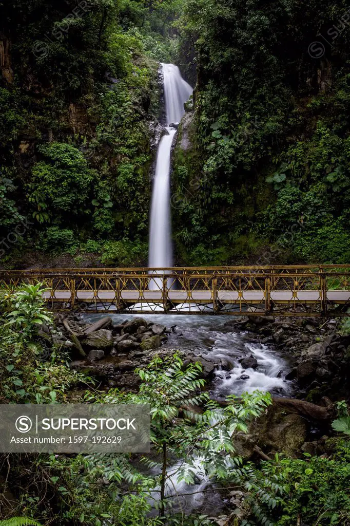 Highway bridge past waterfall on road to La Fortuna, Costa Rica, Central America