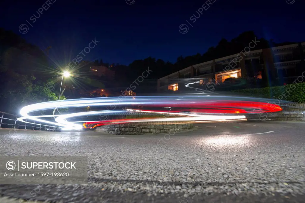 Light trails over a road curve in ticino Switzerland, Europe,