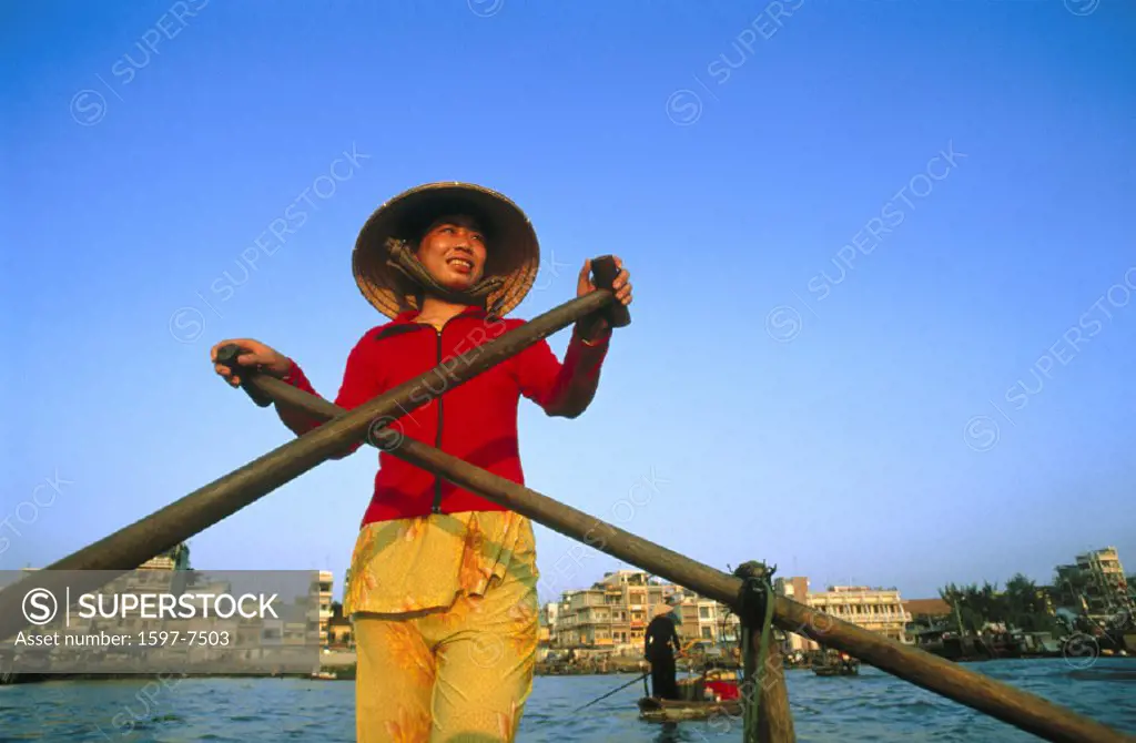 10643399, Boat Woman, Cantho, woman, life, Mekong delta, person, rowing boat, town, city, straw hat, Vietnam, Asia,