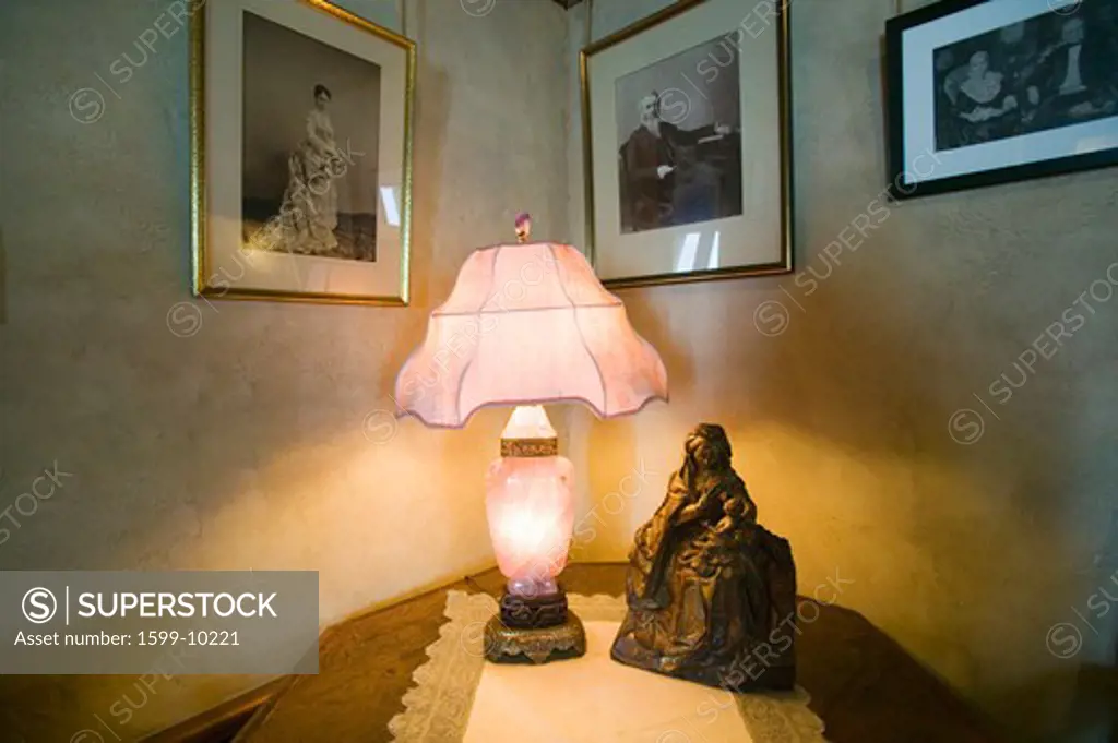 Antique light in interior of guest bedroom at Hearst Castle, 'America's Castle,' San Simeon, Central California Coast