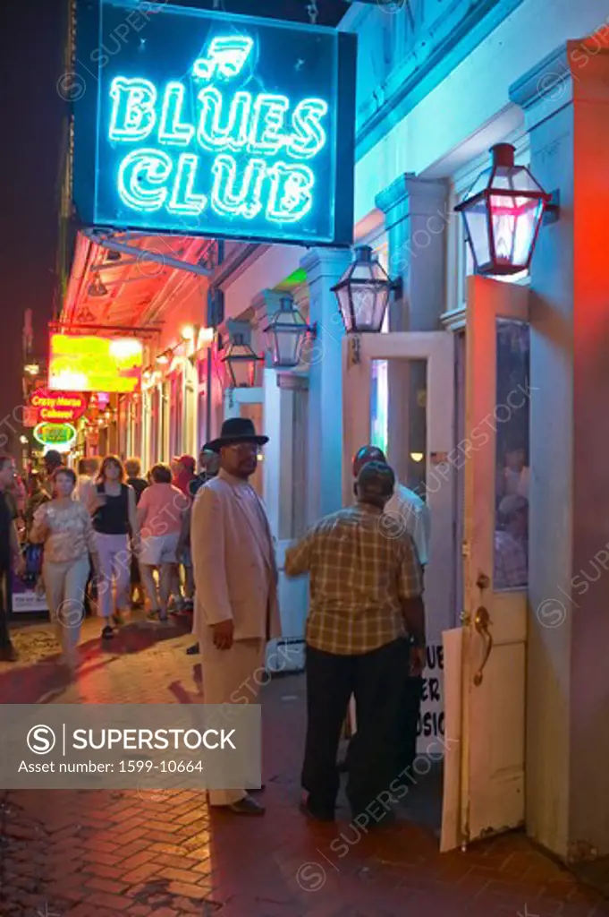 Blues club and neon lights on Bourbon Street in French Quarter of New Orleans, Louisiana