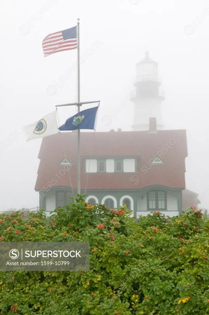 Fog shrouds the Portland Head Lighthouse in Cape Elizabeth, Maine