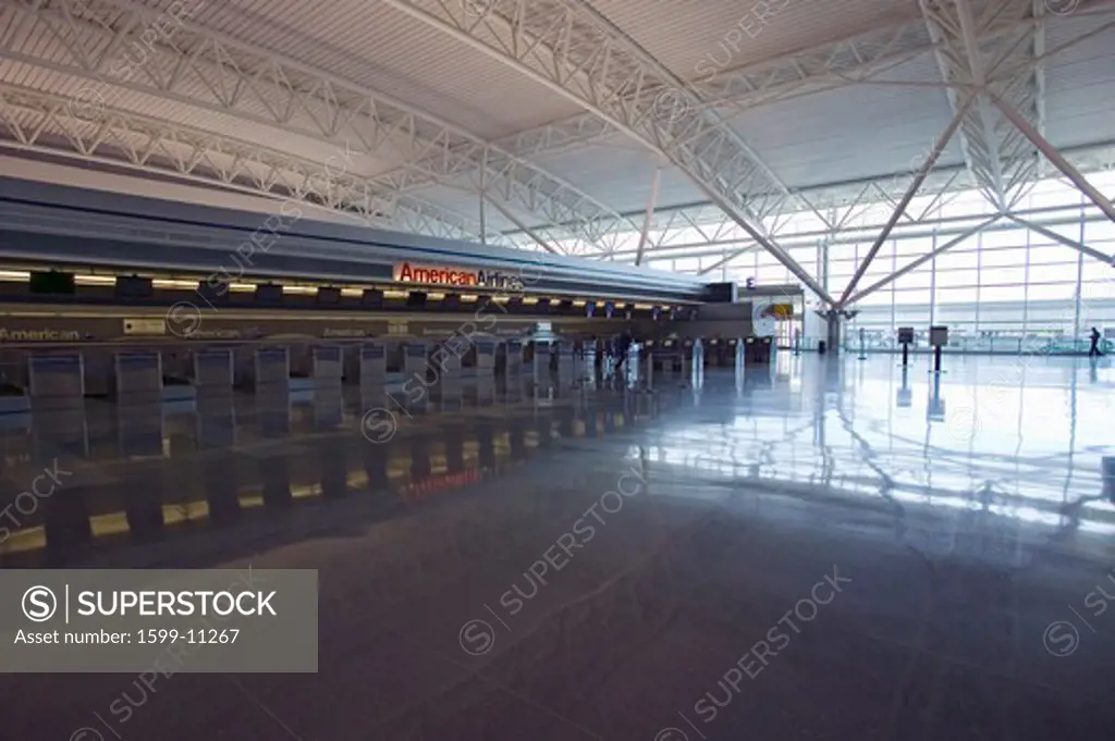 Empty ticket counter and reflections at JFK International Airport, New York City, New York