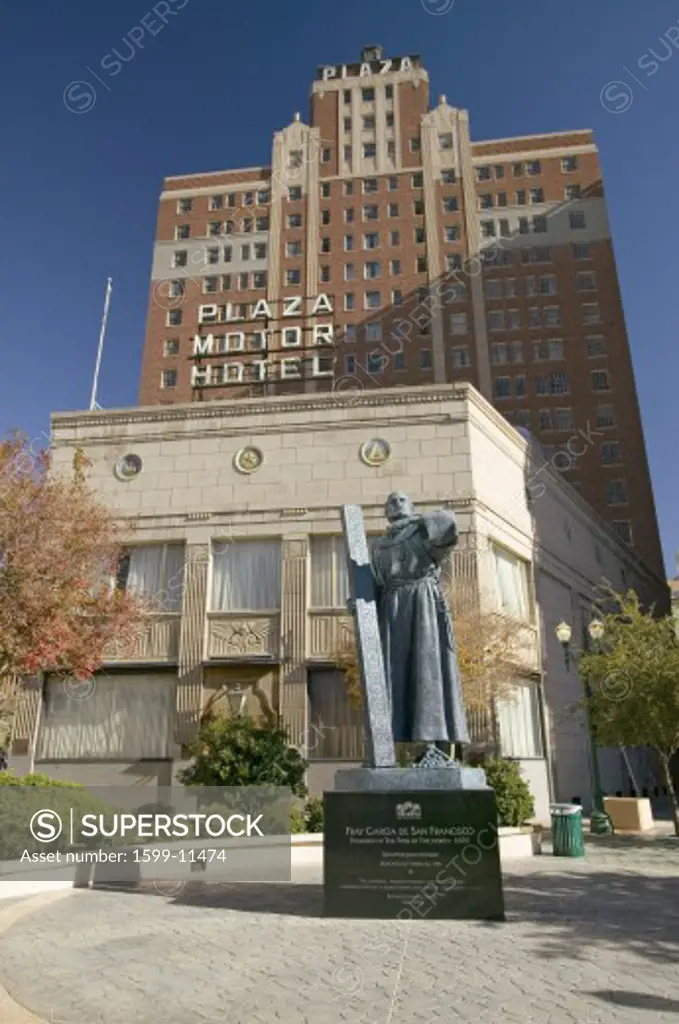 Garcia de San Francisco statue with cross in front of Plaza Motor Hotel in Plaza district of El Paso, Texas