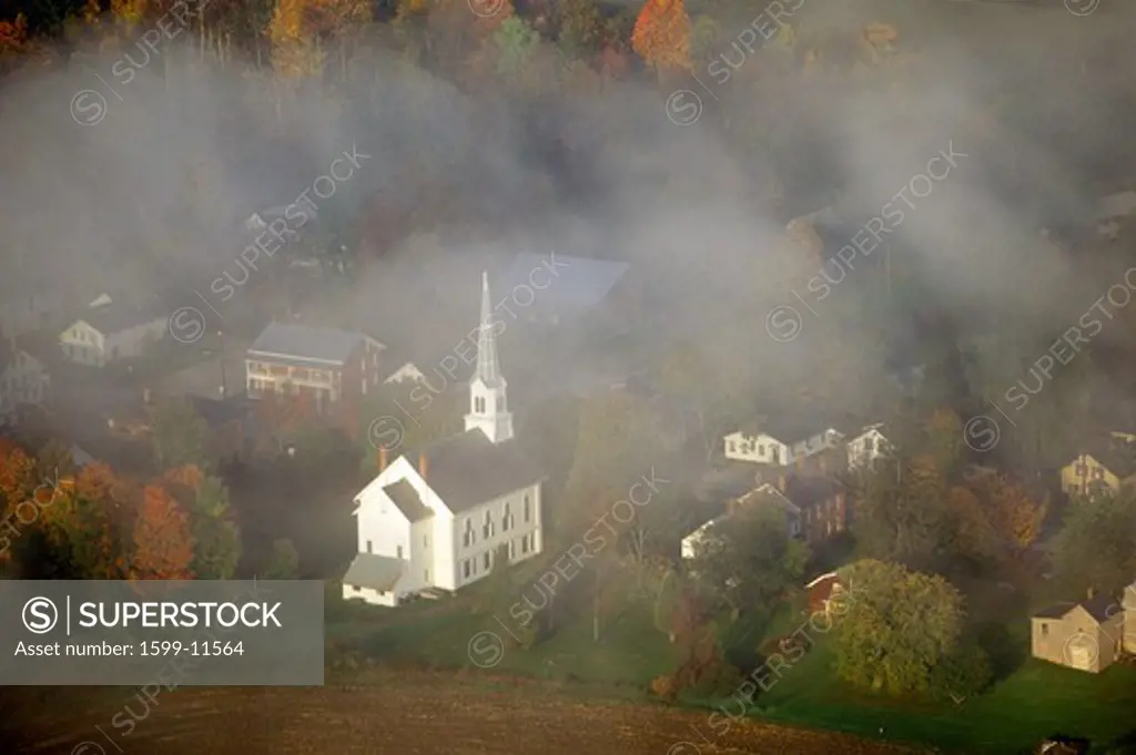 Aerial view of Stowe, VT in Autumn on Scenic Route 100, through fog