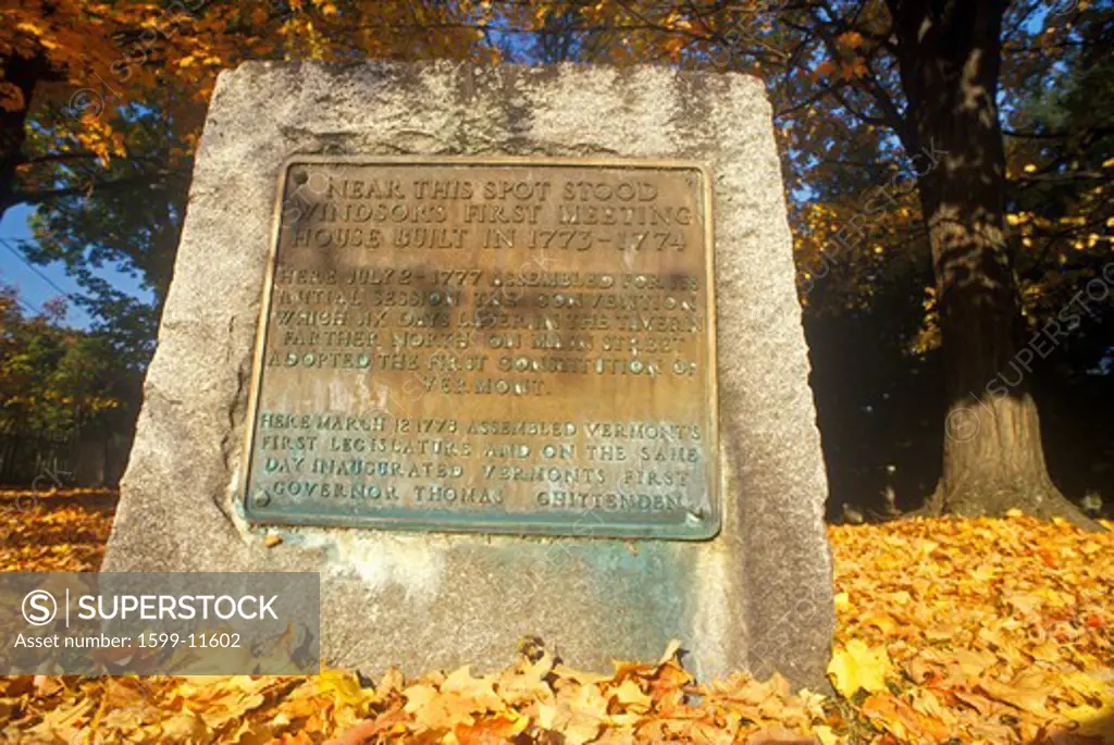 Stone and plaque marking founding of Windsor, VT in autumn
