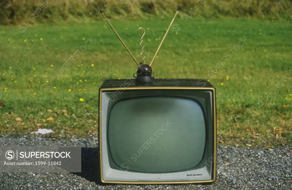 Old retro television set with rabbit ears antennae, New England