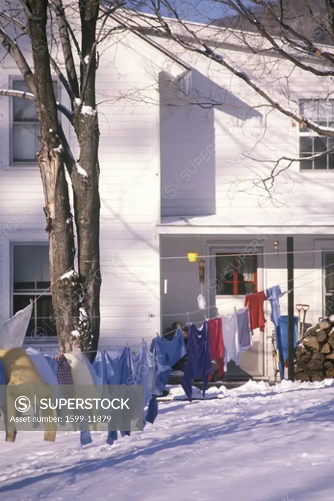 Clothes on laundry line in snowy yard, Woodstock, NY