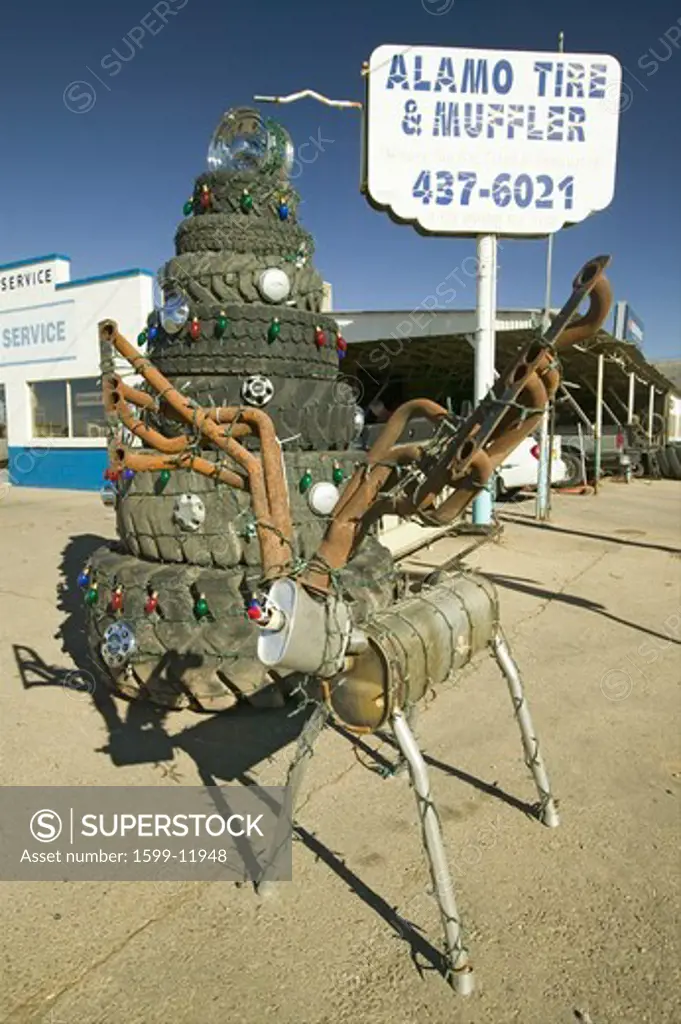 Deer made out of mufflers & stack of tires at Alamo Tires & Muffler in Alamogordo, southern New Mexico off route 54