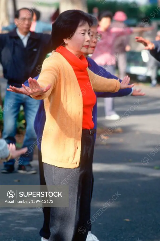 A Chinese woman doing Tai Chi, San Francisco, CA