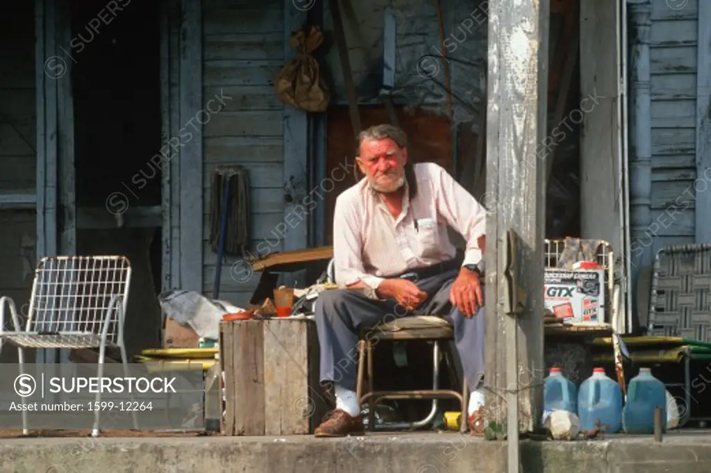 An elderly man on his front porch, Appalachia, VA