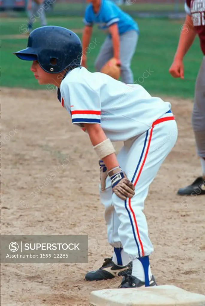A Youth League baseball player at first base, Hebron, CT