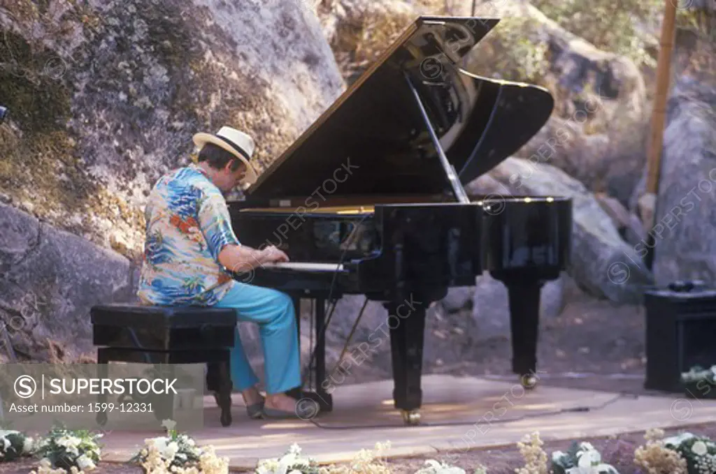 Jazz pianist, Roger Kellaway, performing at an outdoor festival, Ojai, CA
