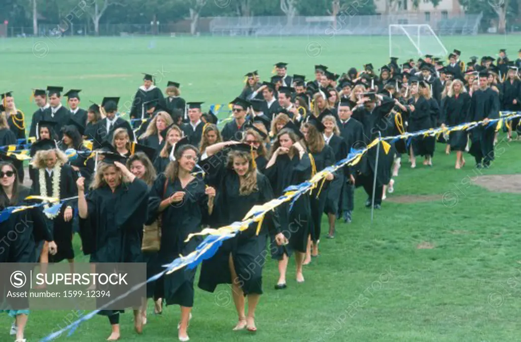 University graduates approaching their ceremony, UCLA, Los Angeles, CA