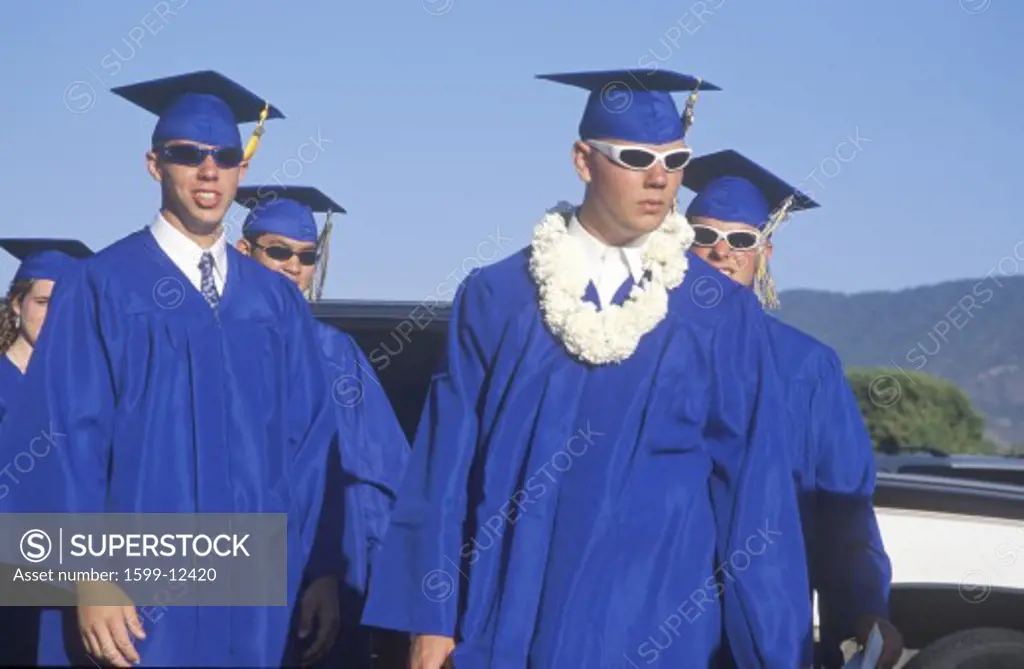 High school graduates wearing sunglasses and a lei, Nordhoff High School, Ojai, CA