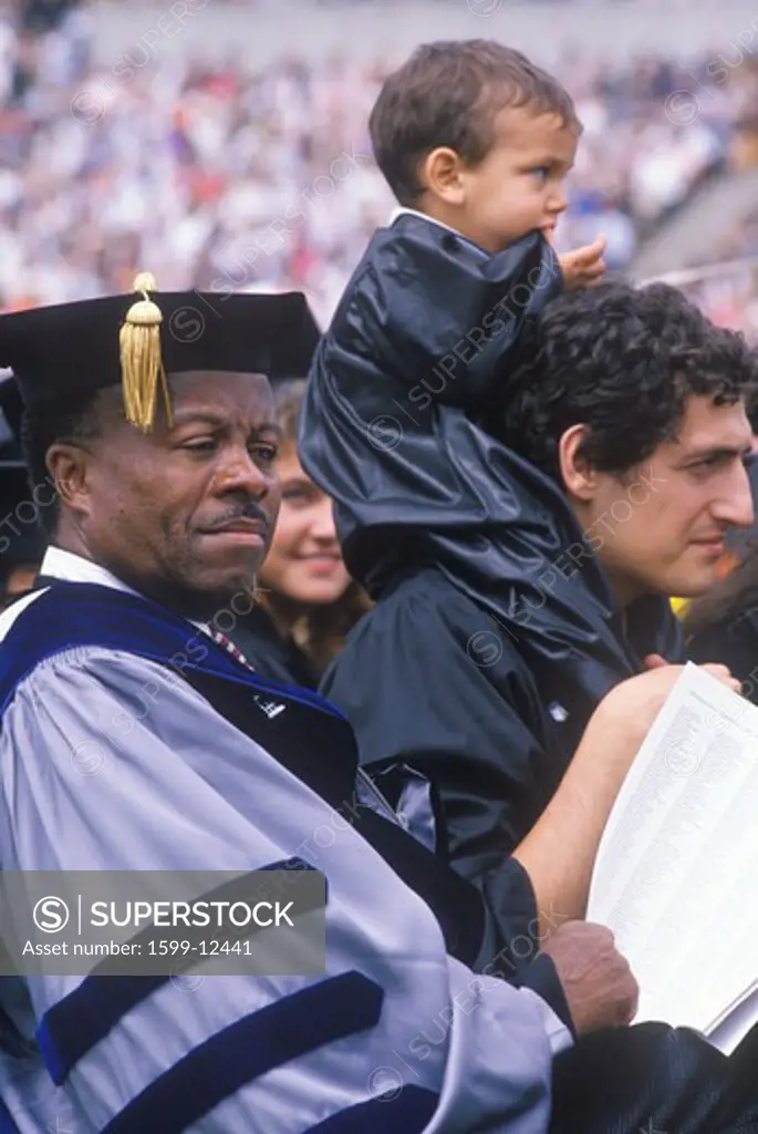 Applauding graduate at ceremony, UCLA, Los Angeles, CA