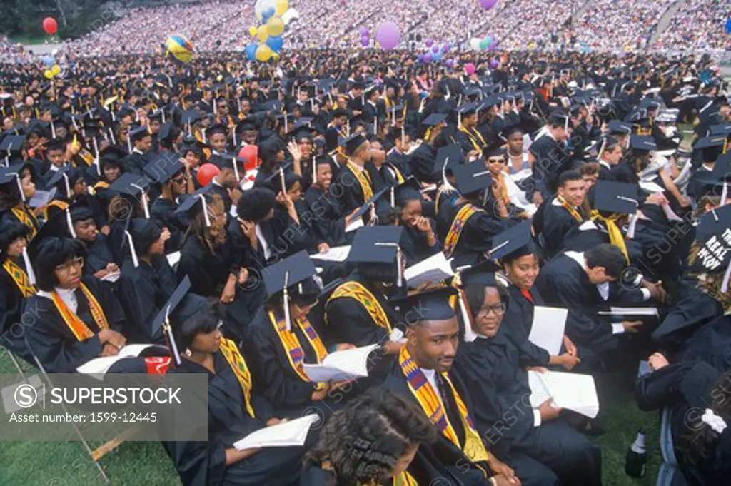 A group of multi ethnic graduates at their graduation ceremony, UCLA,LA,CA