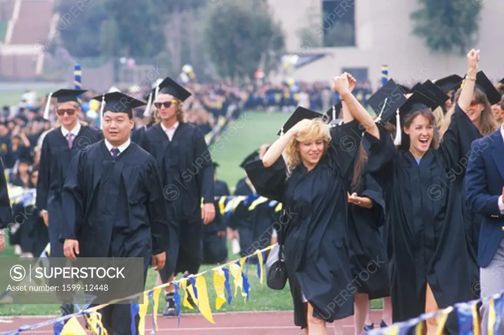 Graduating class walking towards their ceremony, UCLA, Los Angeles, CA